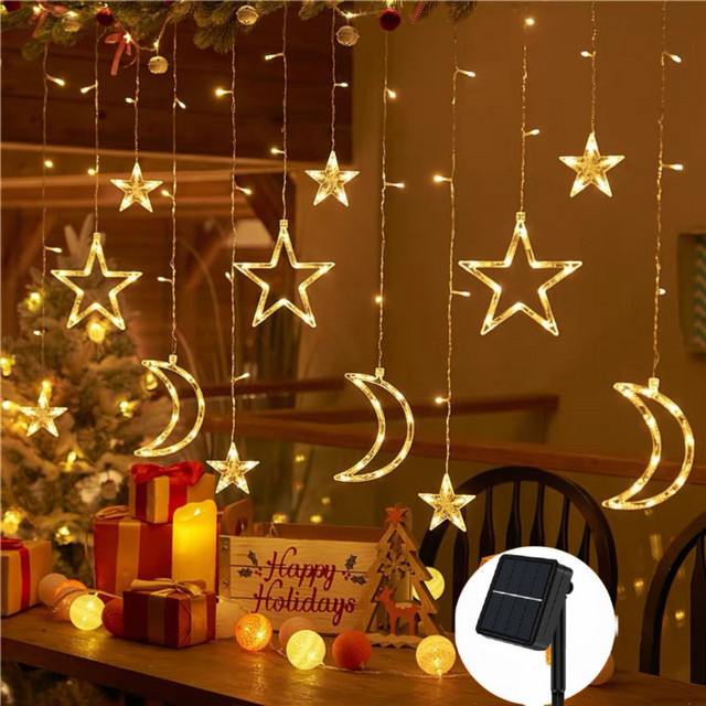 Leclstar Solarbetriebene LED-Vorhang-Lichterkette mit Stern- und Mond-Motiven in Warmweiß, 3,5 m Länge - Bild 1