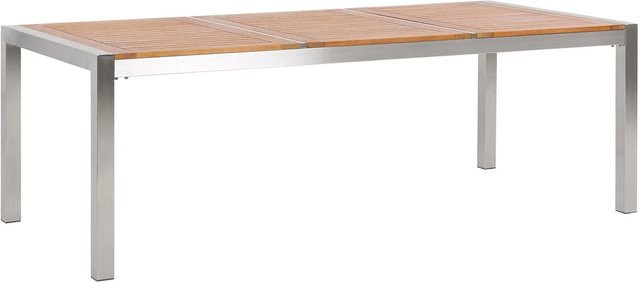 Beliani Gartentisch GROSSETO aus Holz und Edelstahl in Heller Holzfarbe und Silber, B/T/H: 220 x 100 x 74 cm - Bild 1