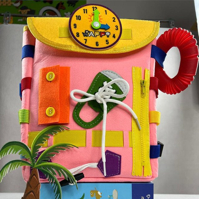 Kidsly Montessori-Beschäftigungsbrett, 30-in-1-Rucksack, Lernaktivitätsspielzeug, ab 0 Jahren, Gelb - Bild 1