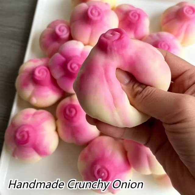 A Family Of Home Textiles Knuspriges Knoblauch Squishy Spielzeug, pink - Bild 1