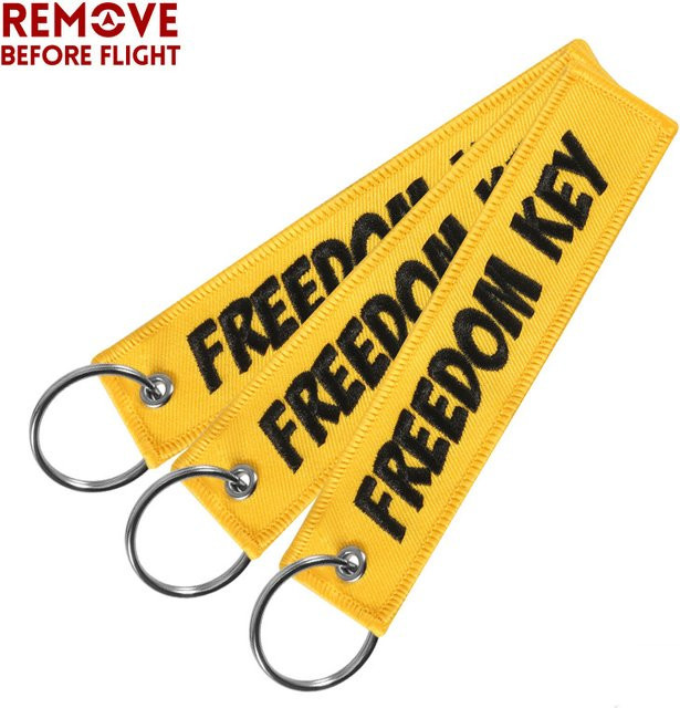 REMOVE BEFORE FLIGHT Schlüsselanhänger, gelbe Stickerei, Bunt, Unisex - Bild 1