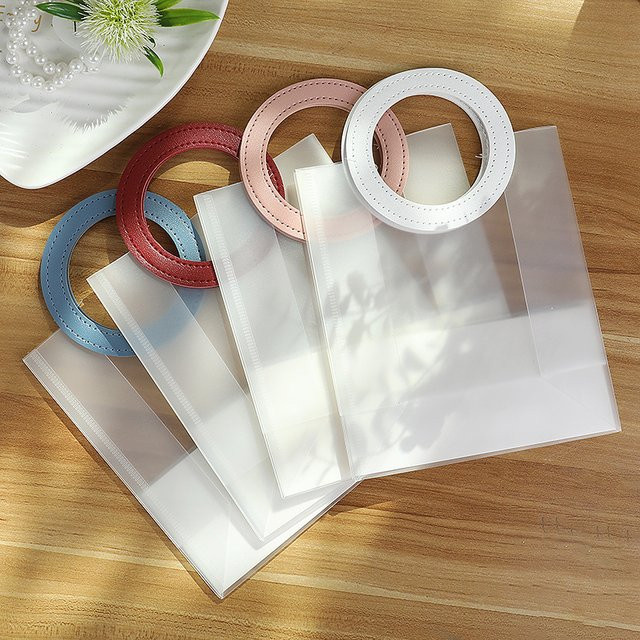 5er Set ZQCXLD Tragetaschen aus transparentem mattem PVC in Macaron-Farben mit runden Griffen für Hochzeiten und Geburtstage - Bild 1