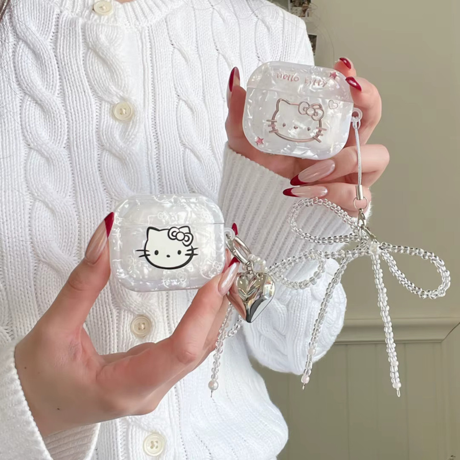 Sanrio Hello Kitty Schutzhülle mit Laser-Muster und Schleifenanhänger für Apple AirPods 4, 3, 2 und Pro 2/Pro 3, transparent - Bild 2