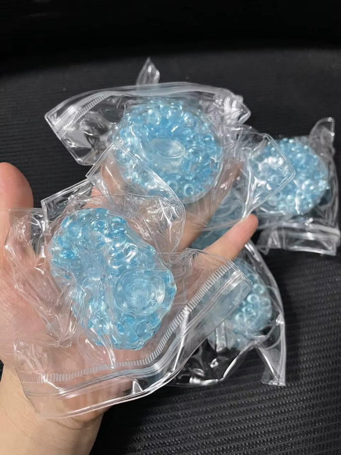 Datgo Quetschbarer Sensorik-Ball, Transparente Perlen, blau - Bild 2