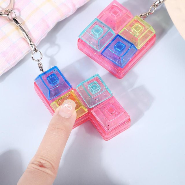 YIYUEQIANLI Fidget Entspannung, 4 Tastaturtasten, Anti-Stress-Spielzeug - Bild 1