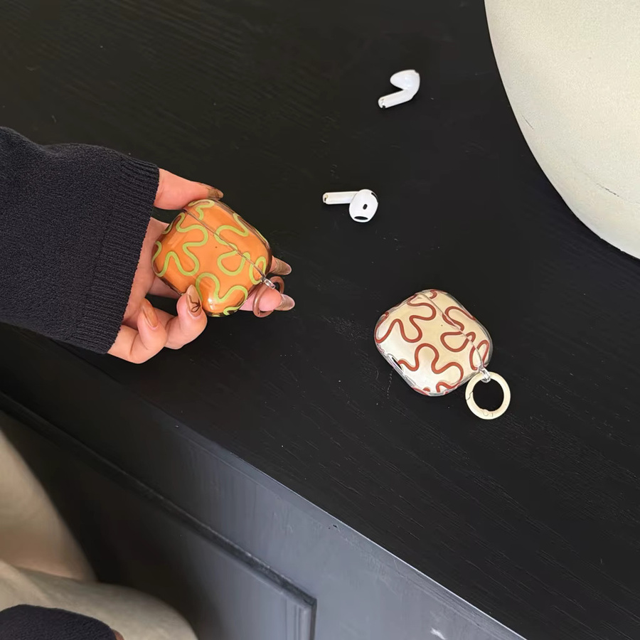 Transparente Apple AirPods Hülle mit Geometrielinien und Haken für AirPods 1, 2, 3, 4 und Pro 2 - Bild 1