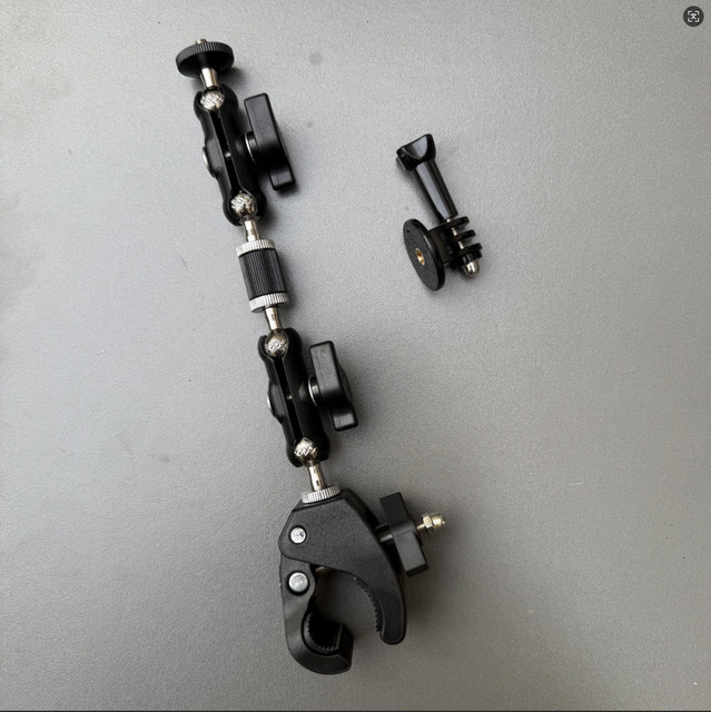 Vielseitige 360 Grad Klemmhalterung aus Metall für GoPro und DJI, schwarze Kamerahalterung mit Gelenk für Outdoor und Fahrrad - Bild 1