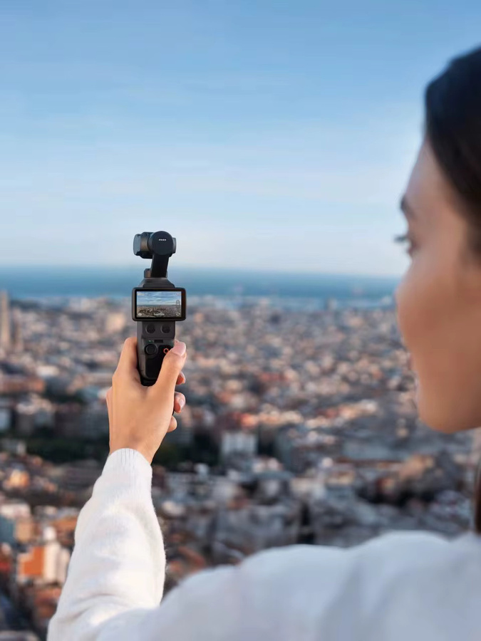 DJI Osmo Pocket 4 Action-Kamera mit 1 Zoll CMOS Sensor, 4K/240fps, 3-Achsen-Stabilisierung und 2 Zoll drehbarem Bildschirm in Schwarz - Bild 3