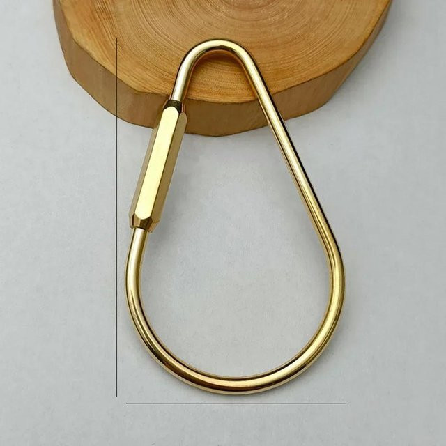 XYNN Schlüsselanhänger Messing, Goldfarben, Unisex - Bild 1