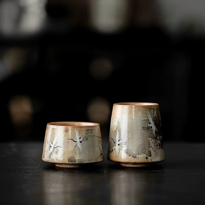 Elegante Jianzhan Teetasse aus Porzellan mit Porzellankranich-Motiv in Braun - Bild 2