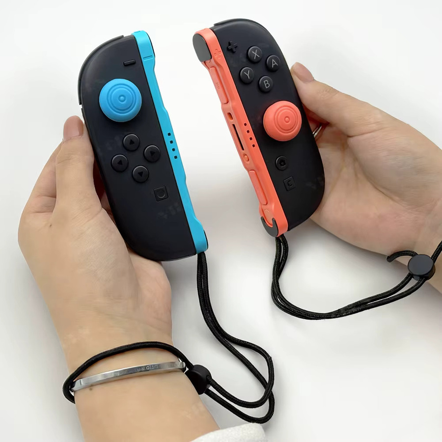 Nintendo Switch Zubehör Handschlaufe für Joycon Controller mit Daumengriffkappen und verstellbarem Trageriemen - Bild 5