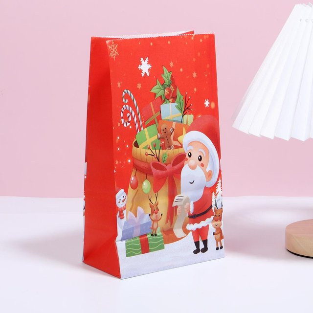 12er Set Weihnachts-Geschenktüten aus Kraftpapier mit Weihnachtsmann Motiv in Rot, B/T/H: 24 x 13 x 8 cm - Bild 1