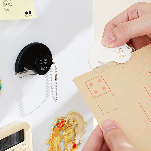 Japanischer Mini-Brieföffner in Weiß aus Kunststoff für sicheres und handfreundliches Auspacken - Bild 1