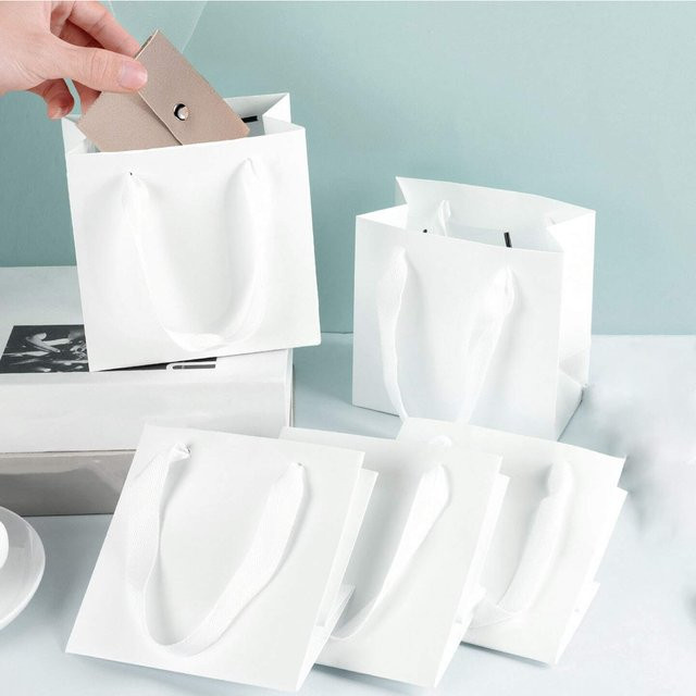 20 Stück weiße Geschenktüten aus Papier mit Griff für Hochzeiten, Geburtstage und Partys - Bild 1