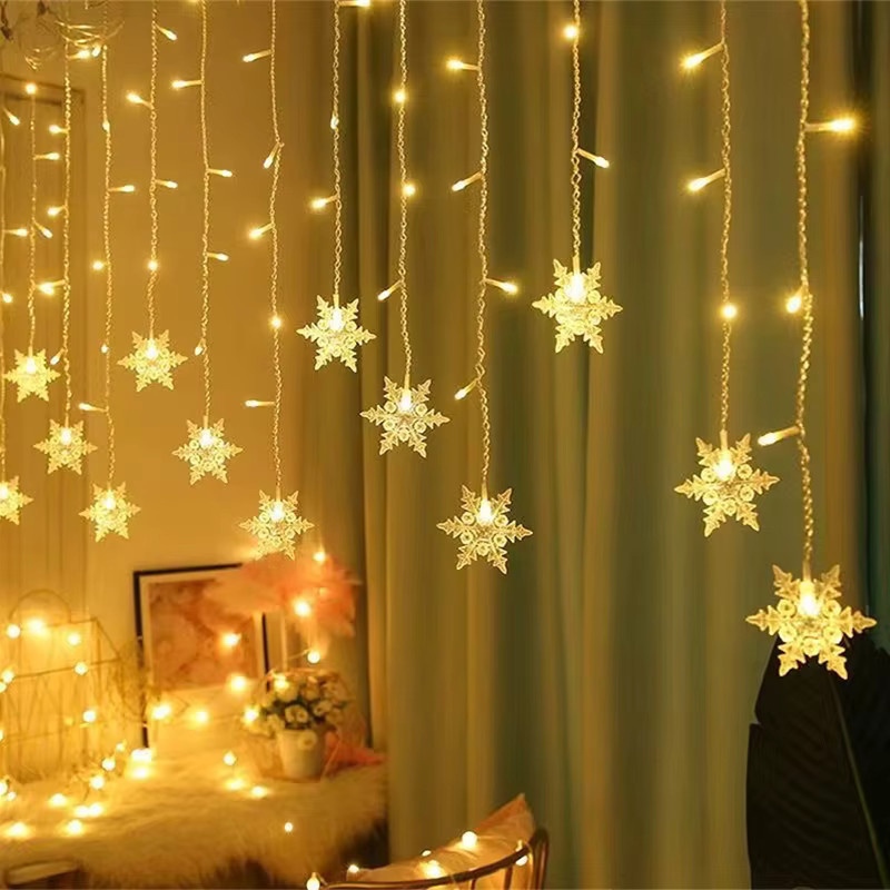 LED Weihnachts-Lichterkette mit Schneeflocken und Eiszapfen in Warmweiß für Fenster und Garten - Bild 2