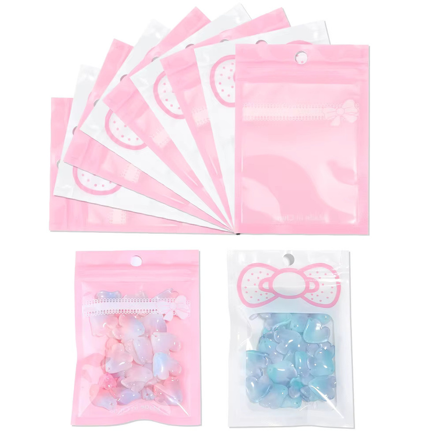20 Stück Lingsai Geschenkverpackungsbeutel mit Schleife in Rosa, selbstverschließende Reißverschlussbeutel aus Kunststoff für Schmuck, Perlen oder Süßigkeiten - Bild 1