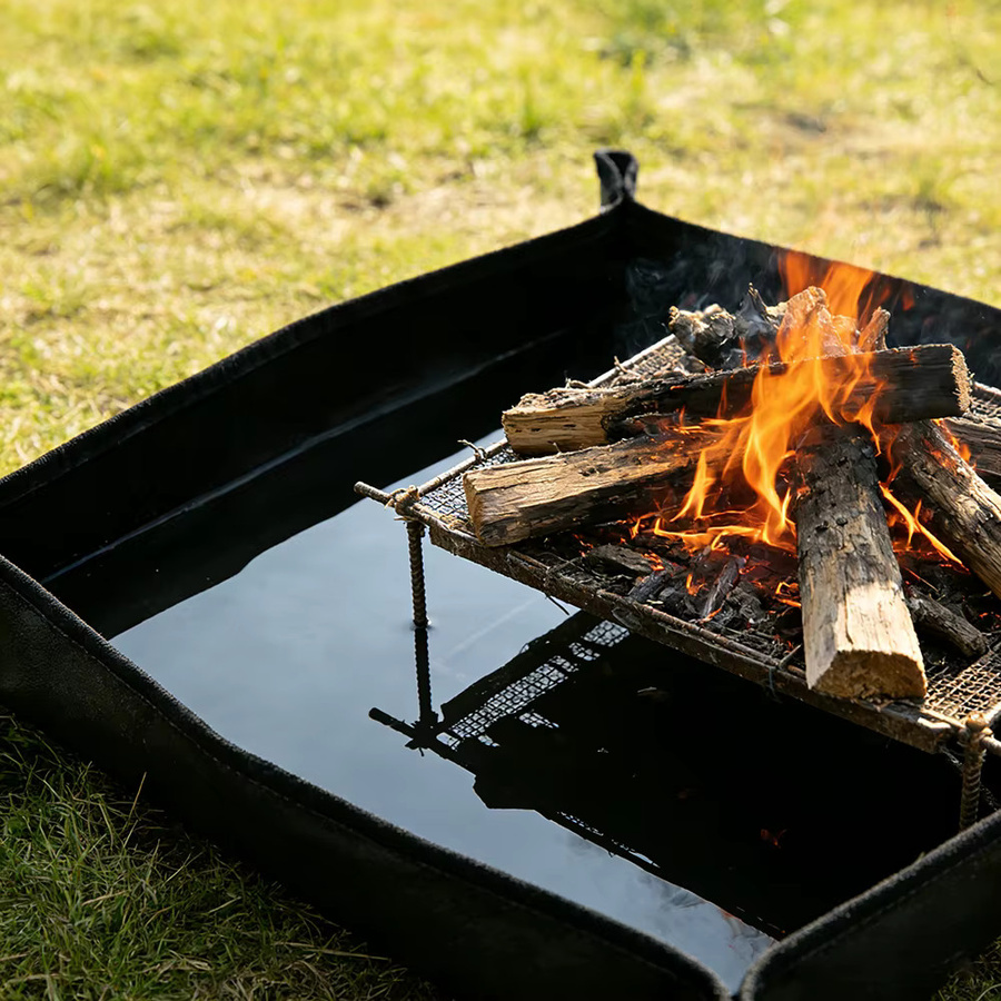 Feuerfeste 3D Silikonmatte von HIDE WALKER in Schwarz als hitzebeständige Bodenschutzunterlage für Campingkocher und Lagerfeuer, B/T: 60 x 50 cm - Bild 1