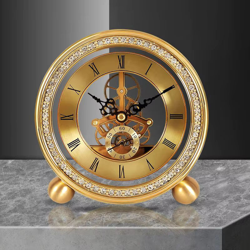 Goldene Pendel-Tischuhr aus Metall in runder Form für dein Wohnzimmer - Bild 1
