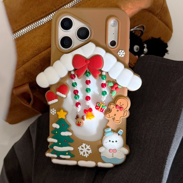 Weihnachtliches 3D Soft Cover für Apple iPhone 17 16 15 14 13 Pro Max mit Lebkuchenmann Schneemann und Elch in Braun inklusive Perlen Anhänger - Bild 1