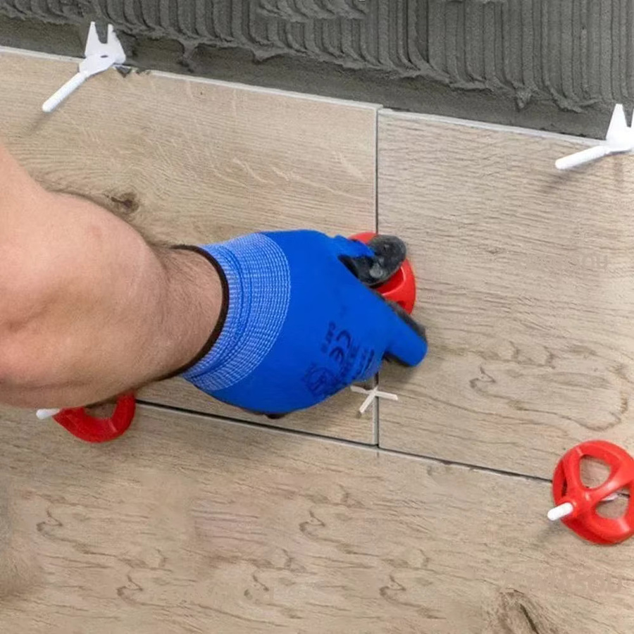 Bauwerk Nivelliersystem für Keramikfliesen mit Abstandhaltern und Keilen zur Fliesenverlegung für Wand und Boden - Bild 4