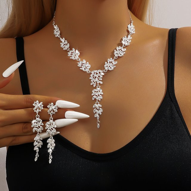 Schmuckset Damen, Halskette, Ohrringe, Silber, Kristall, Blumen- und Blättermotiv - Bild 1