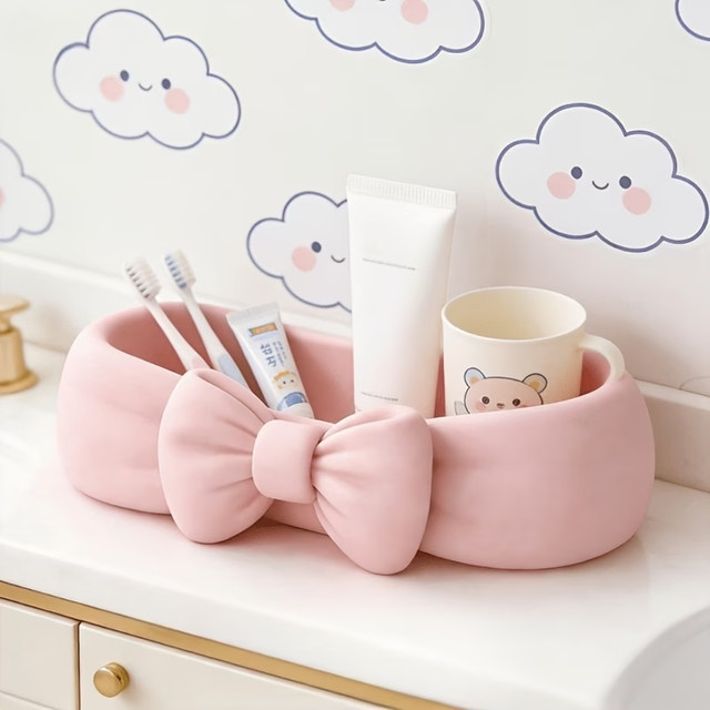 Rosa Schreibtisch-Organizer mit Schleife aus Kunststoff als süße Kosmetik-Ablage und Aufbewahrungsbox für Zahnbürste und Hautpflege - Bild 1