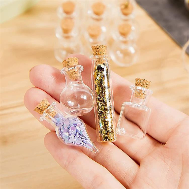 10 Stück Mini-Glasflaschen aus Borosilikatglas mit Korkstopfen in transparent, verschiedene Formen wie Herz, Stern und Kugel für deine Dekoration und Wunschgeschenke - Bild 5
