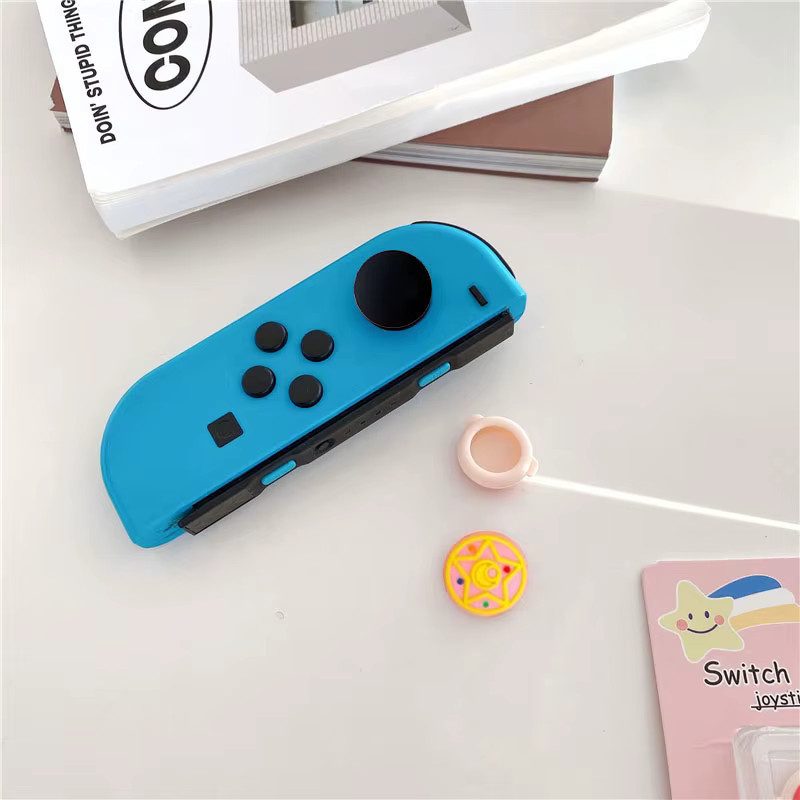 4 Stück Cartoon Daumengriffkappen aus weichem Silikon für Nintendo Switch OLED, Lite und Joy-Con Controller in Multicolor - Bild 2