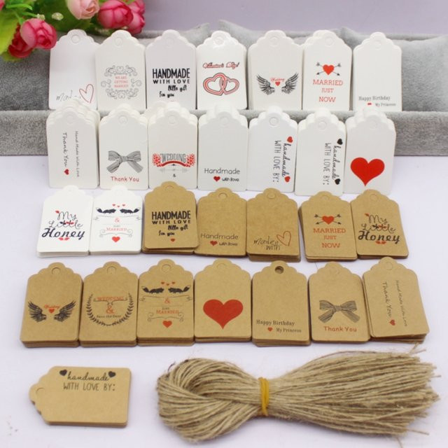 100 Etikettenanhänger aus weißem Kraftpapier mit 100 Saiten, B/H: 5 x 3 cm - Bild 1