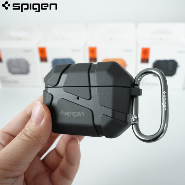 Spigen Rugged Armor Kopfhörer-Schutzhülle für AirPods 4/3/2/1 Pro 2 mit Meteorit-Textur und Schlüsselanhänger in Schwarz - Bild 1