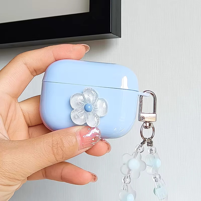 YOISH Schutzhülle für Apple AirPods Pro 1 2 3 mit blauem 3D Kristallblumen-Anhänger und Armband, transparent - Bild 2