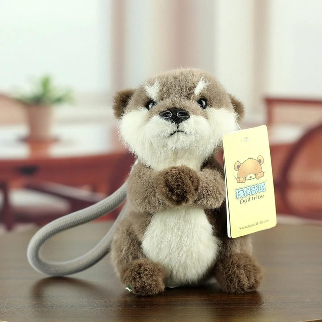 Binchi Fitness Grauer Seeotter mit Muschel, Plüsch Schlüsselanhänger, 15cm - Bild 1
