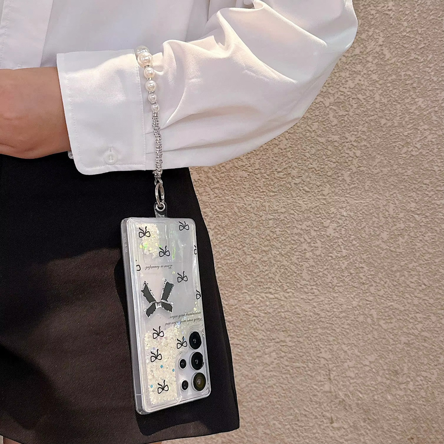 Luxuriöse Glitzer-Schutzhülle mit Treibsand-Effekt und schwarzer Schleife für Samsung Galaxy S22 Plus, S23, S24 und S25 Ultra inklusive Trageband in Schwarz - Bild 3
