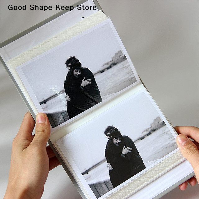 Beschreibbares Fotoalbum aus Leinen in Weiß mit 100 Taschen für 4x6 Fotos zur Aufbewahrung deiner Erinnerungen - Bild 1