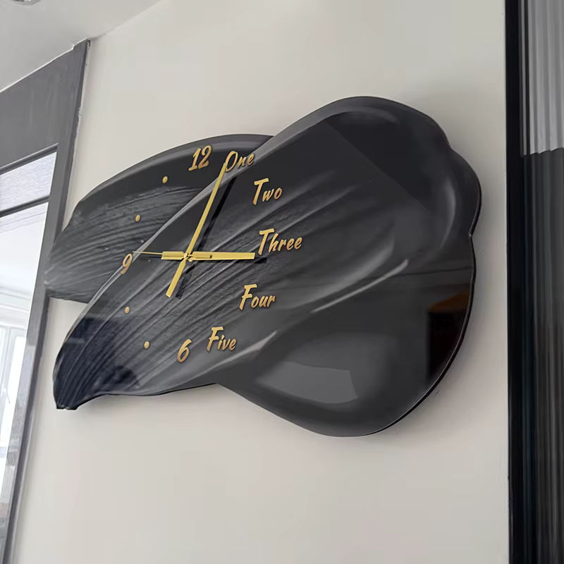 Oeny Moderne Wanduhr in Schwarz mit Beleuchtung und geräuschlosem Analog-Uhrwerk, abstrakte Wanddekoration in unregelmäßiger Form - Bild 2