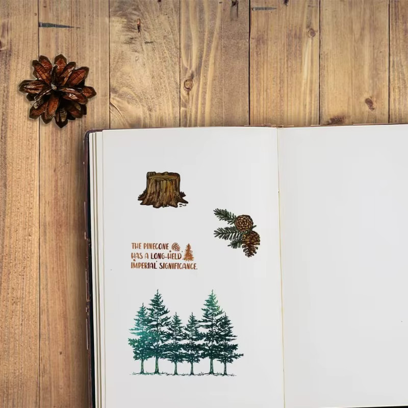 Transparenter Silikonstempel mit Kiefernzapfen und Tannenbaum Motiv für Vintage-Poststempel - Bild 3