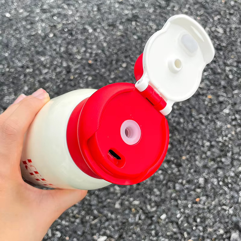 Sanrio Hello Kitty Thermosbecher aus Edelstahl 316L in Blau und Weiß, tragbare Outdoor-Sportwasserflasche mit Dual-Trinkfunktion, 750 ml - Bild 2