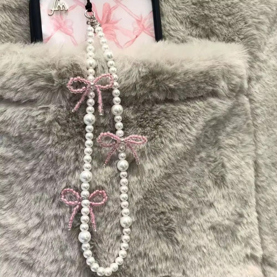 Rosa Perlen-Handylanyard mit Schleife und Perlenanhänger für iPhone als Schmuck-Zubehör für Damen und Mädchen - Bild 3