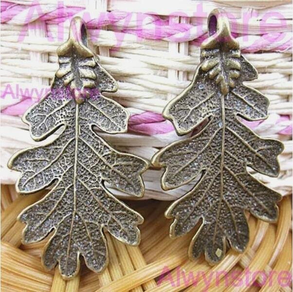Charm-Anhänger Blatt, Antik-Bronze, 48 x 26 mm, Unisex - Bild 1