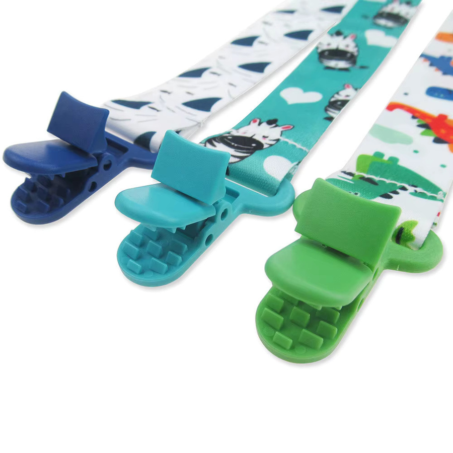 GOT-TOG Baby Schnuller Kette im 3er Set mit Cartoon Print, Farben: Grün und Mehrfarbig - Bild 2