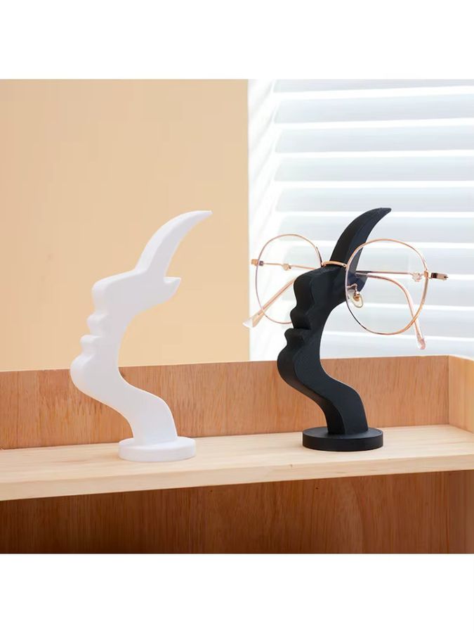 Minimalistischer Brillenhalter mit Gesicht von DUTRIEUX in Schwarz aus Kunststoff - Bild 3