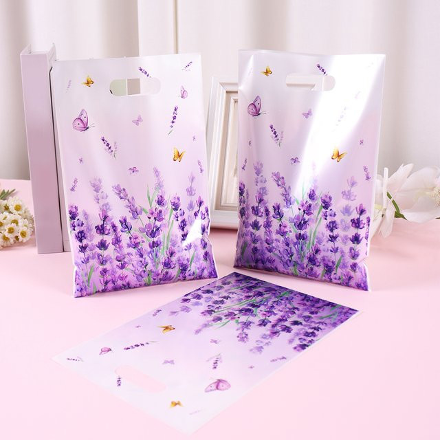 Lavendel-Geschenktüten aus Kunststoff in Lila als dekorative Verpackung für Süßigkeiten und Partyzubehör - Bild 1