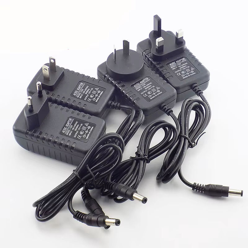 AC DC Netzteil Adapter 12V 2A 2000mA mit EU UK AU US Stecker für LED Streifen und Lampen, Anschluss 5,5mm x 2,5mm - Bild 4
