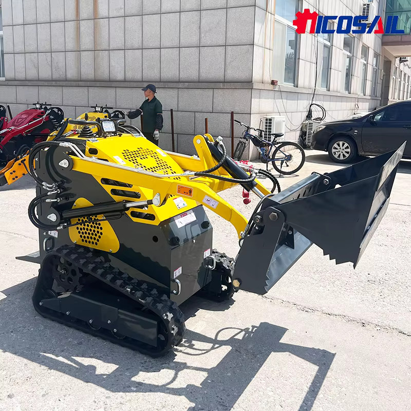 Kubota Mini Skidsteer Loader Kompaktlader mit Diesel Raupenantrieb in Gelb - Bild 2