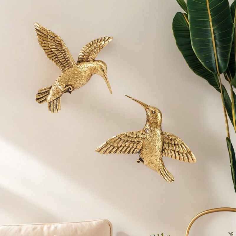 Dekorative Wanddekoration in Form eines fliegenden Kolibris aus Kunstharz und Metall in Gold - Bild 1