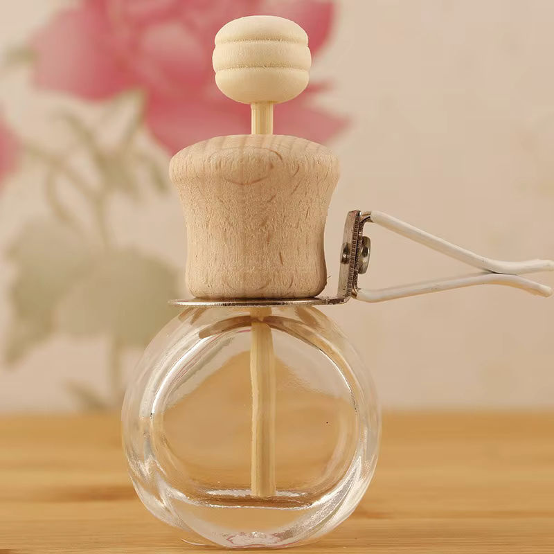 Transparenter Glas Flaschen Lufterfrischer als hängender Aromatherapie Diffusor für dein Auto - Bild 2