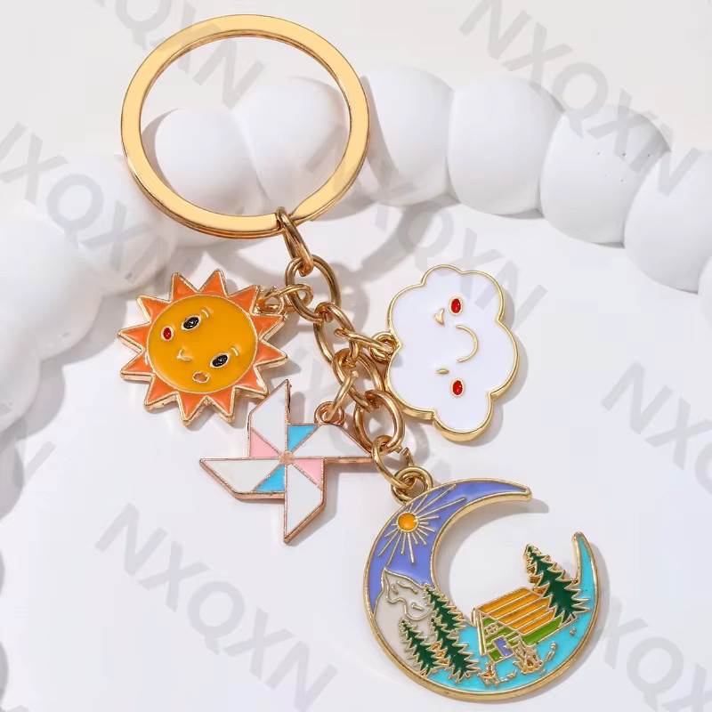 NXQXN Schlüsselanhänger Emaille, Sonne Wolke, Unisex - Bild 2