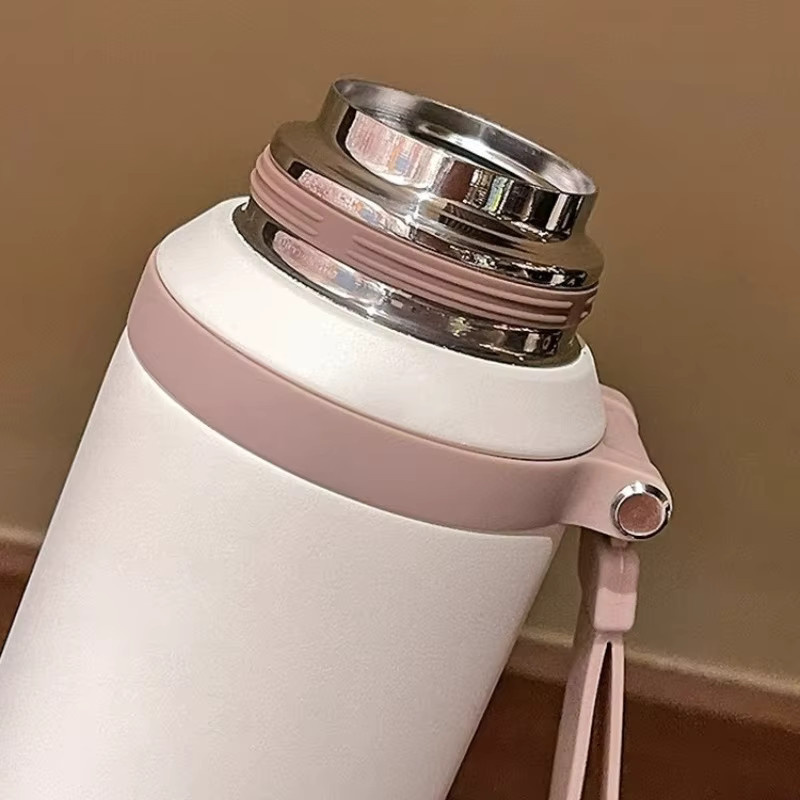 JUSTINLAU Thermosbecher Vakuumflaschen mit Teesieb aus Edelstahl, tragbare Reise-Thermowasserflaschen in Grün und Weiß, 600/800 ml - Bild 4