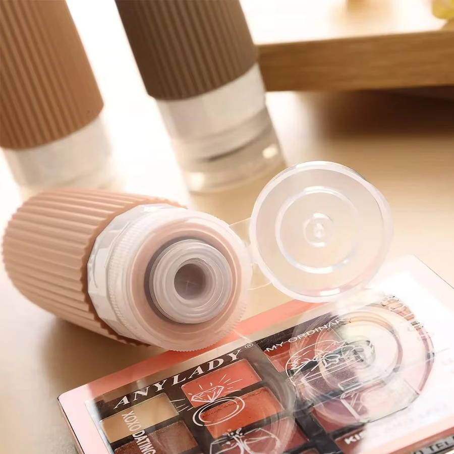 4er-Set Silikon-Reiseflaschen in Braun, auslaufsichere und zusammendrückbare Shampoo-Spender für deine Reise, 100 ml pro Flasche - Bild 4