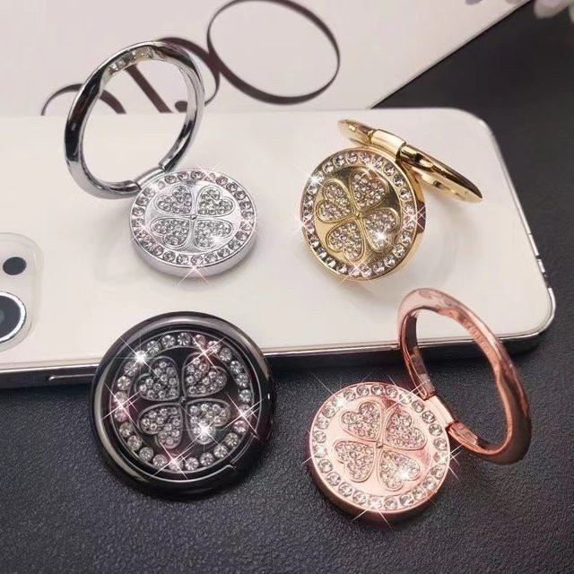360 Grad drehbarer Fingerringhalter mit Strass und vierblättrigem Kleeblatt Design für dein Smartphone - Bild 1